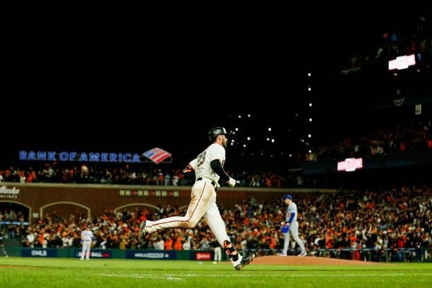 Kris Bryant of the San Francisco Giants runs the bases after hitting a solo home run in the seventh inning during Game 1 of the NLDS between the Los...