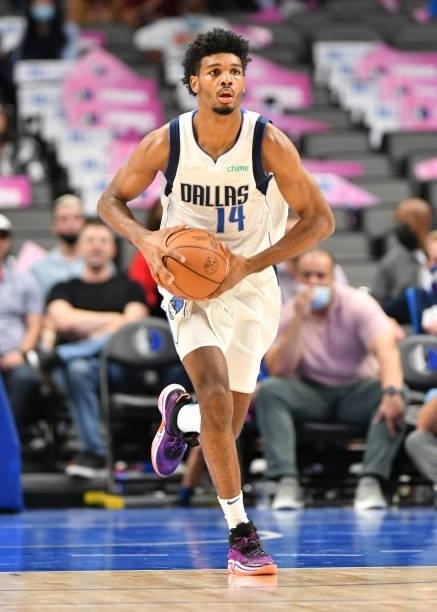 Feron Hunt of the Dallas Mavericks dribbles the ball during a preseason game against the LA Clippers on October 8, 2021 at the American Airlines...