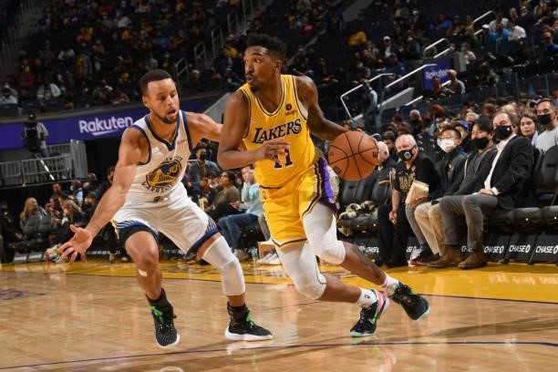 Malik Monk of the Los Angeles Lakers drives to the basket during a preseason game against the Golden State Warriors on October 8, 2021 at Chase...
