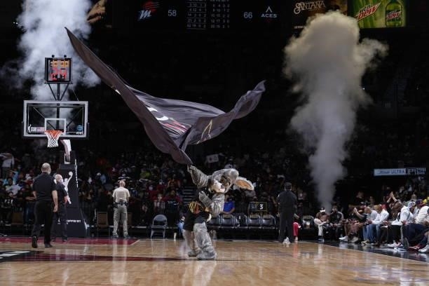 The Las Vegas Aces mascot, BUCKET$, waves a flag during Game Five of the 2021 WNBA Semifinals against the Phoenix Mercury on October 8, 2021 at...
