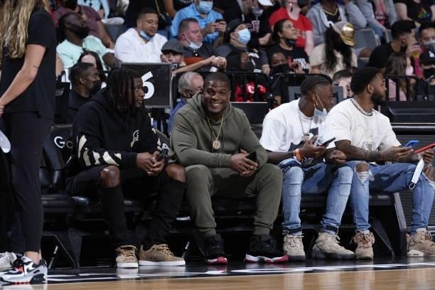 Players Cory Littleton, Denzel Perryman, Henry Ruggs III, and Keisean Nixon attend Game Five of the 2021 WNBA Semifinals between the Phoenix Mercury...