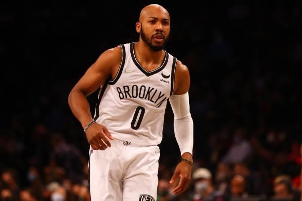 Jevon Carter of the Brooklyn Nets in action against the Milwaukee Bucks at Barclays Center on October 08, 2021 in New York City. NOTE TO USER: User...