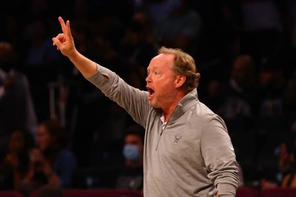 Head Coach Mike Budenholzer of the Milwaukee Bucks signals form the bench during the game against the Brooklyn Nets at Barclays Center on October 08,...