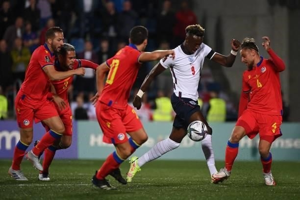 England's forward Tammy Abraham vies with Andorra's midfielder Marc Rebes during the World Cup 2022 qualifier football match between Andorra and...