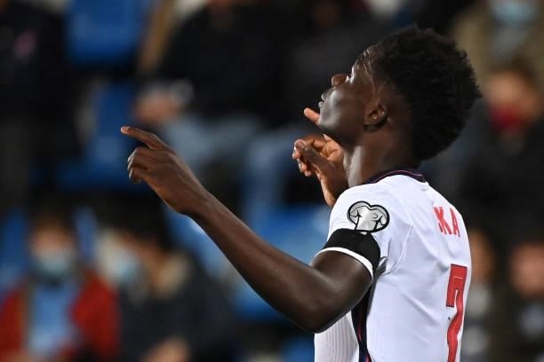 England's midfielder Bukayo Saka celebrates after scoring a goal during the World Cup 2022 qualifier football match between Andorra and England at...