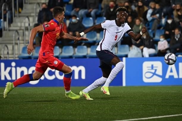 Andorra's defender Christian Garcia vies with England's forward Tammy Abraham during the World Cup 2022 qualifier football match between Andorra and...