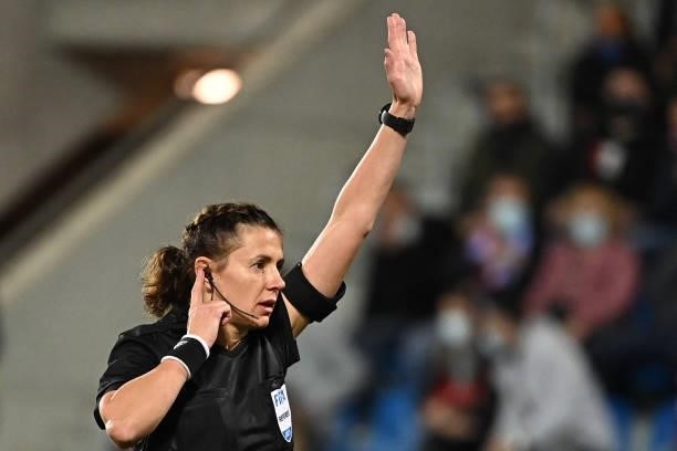 Ukrainian referee Kateryna Monzul waits for video assistance to validate a goal during the World Cup 2022 qualifier football match between Andorra...