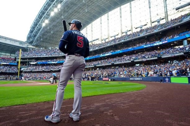 Freddie Freeman of the Atlanta Braves looks on from the on deck circle during Game 2 of the NLDS between the Atlanta Braves and the Milwaukee Brewers...