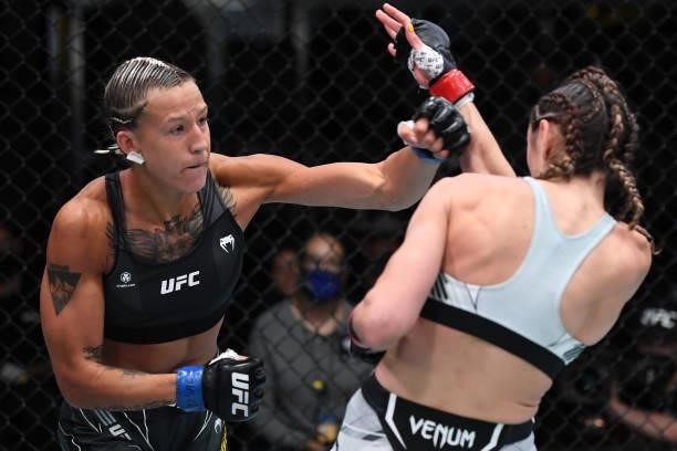 In this UFC handout, Mariya Agapova of Kazakhstan punches Sabina Mazo of Colombia in their bantamweight bout during the UFC Fight Night event at UFC...