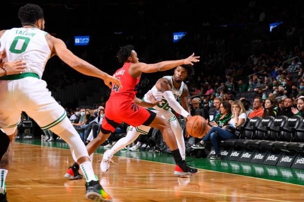Marcus Smart of the Boston Celtics passes the ball to Jayson Tatum of the Boston Celtics during a preseason game against the Toronto Raptors on...