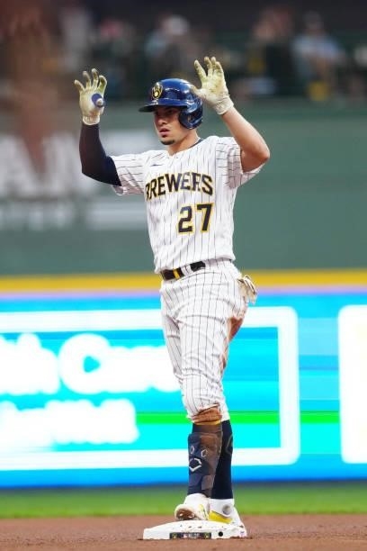Willy Adames of the Milwaukee Brewers reacts to hitting a double in the sixth inning during Game 2 of the NLDS between the Atlanta Braves and the...
