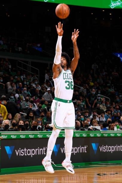 Marcus Smart of the Boston Celtics shoots the ball during a preseason game against the Toronto Raptors on October 9, 2021 at the TD Garden in Boston,...