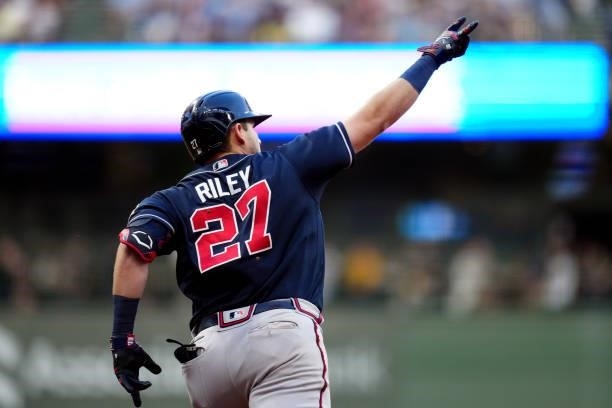 Austin Riley of the Atlanta Braves rounds the bases after hitting a solo home in the sixth inning during Game 2 of the NLDS between the Atlanta...