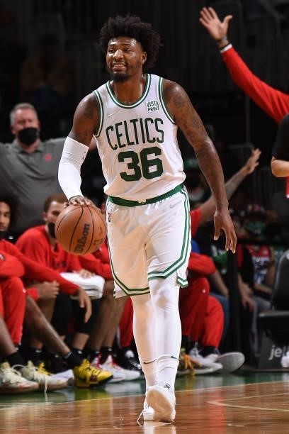 Marcus Smart of the Boston Celtics dribbles the ball during a preseason game against the Toronto Raptors on October 9, 2021 at the TD Garden in...