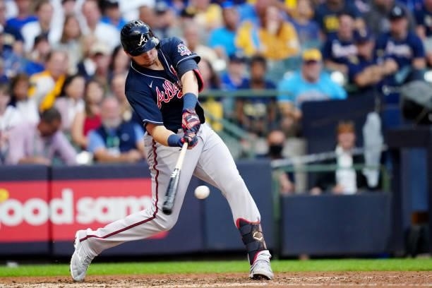 Austin Riley of the Atlanta Braves hits a solo home in the sixth inning during Game 2 of the NLDS between the Atlanta Braves and the Milwaukee...