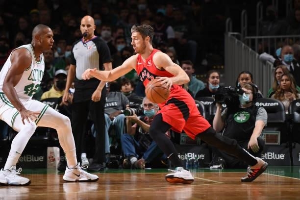 Goran Dragic of the Toronto Raptors drives to the basket during a preseason game against the Boston Celtics on October 9, 2021 at the TD Garden in...
