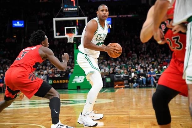 Al Horford of the Boston Celtics handles the ball during a preseason game against the Toronto Raptors on October 9, 2021 at the TD Garden in Boston,...