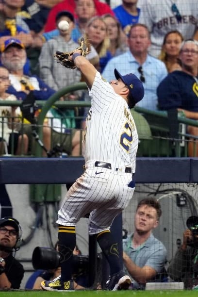 Luis Urías of the Milwaukee Brewers catches catches a foul ball pop-u during Game 2 of the NLDS between the Atlanta Braves and the Milwaukee Brewers...