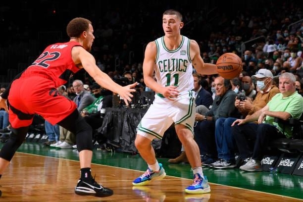 Payton Pritchard of the Boston Celtics passes the ball during a preseason game against the Toronto Raptors on October 9, 2021 at the TD Garden in...