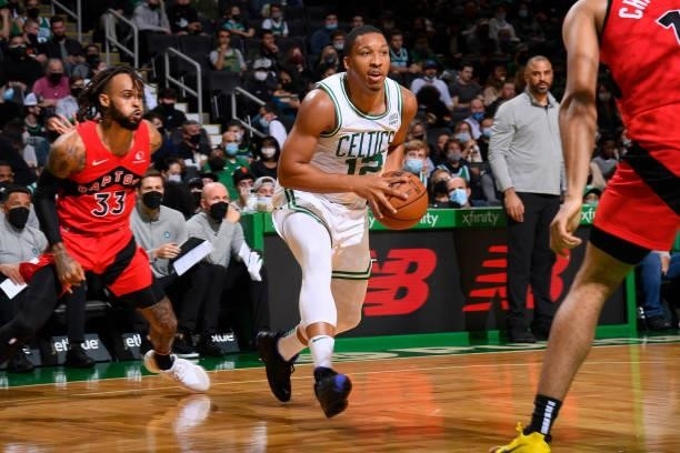 Grant Williams of the Boston Celtics drives to the basket during a preseason game against the Toronto Raptors on October 9, 2021 at the TD Garden in...