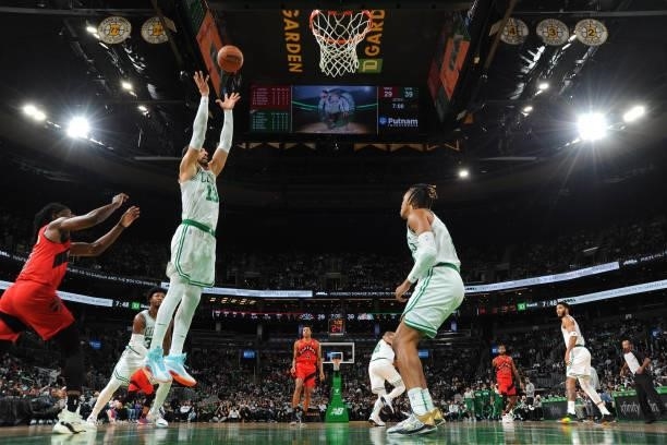 Enes Kanter of the Boston Celtics catches the rebound during a preseason game against the Toronto Raptors on October 9, 2021 at the TD Garden in...