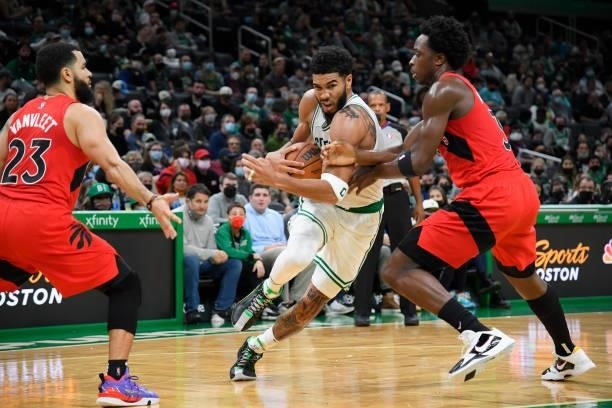 Jayson Tatum of the Boston Celtics drives to the basket during a preseason game against the Toronto Raptors on October 9, 2021 at the TD Garden in...