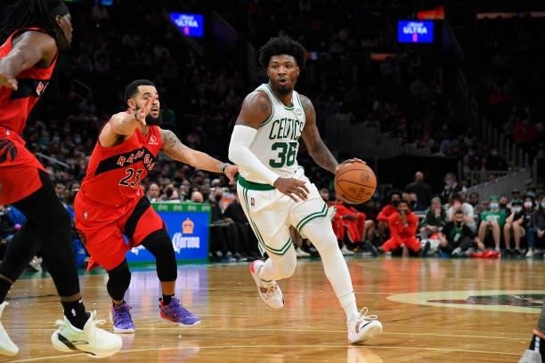 Marcus Smart of the Boston Celtics drives to the basket during a preseason game against the Toronto Raptors on October 9, 2021 at the TD Garden in...