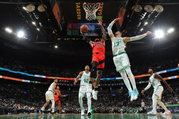 Gary Trent Jr. #33 of the Toronto Raptors drives to the basket during a preseason game against the Boston Celtics on October 9, 2021 at the TD Garden...