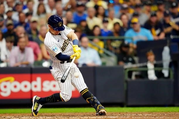 Luis Urías of the Milwaukee Brewers singles in the seventh inning during Game 2 of the NLDS between the Atlanta Braves and the Milwaukee Brewers at...