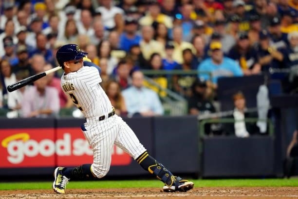 Luis Urías of the Milwaukee Brewers singles in the seventh inning during Game 2 of the NLDS between the Atlanta Braves and the Milwaukee Brewers at...