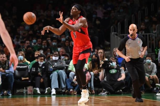 Precious Achiuwa of the Toronto Raptors passes the ball during a preseason game against the Boston Celtics on October 9, 2021 at the TD Garden in...