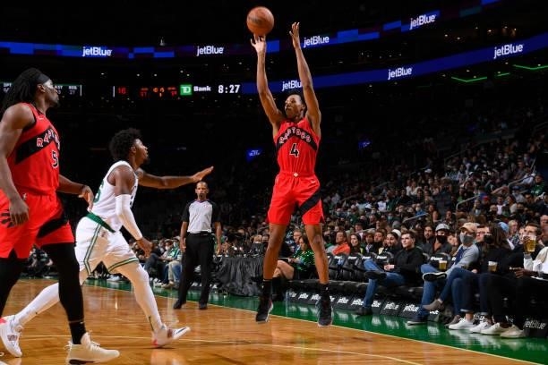 Scottie Barnes of the Toronto Raptors shoots a three point basket during a preseason game against the Boston Celtics on October 9, 2021 at the TD...
