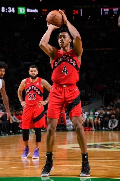 Scottie Barnes of the Toronto Raptors shoots a free throw during a preseason game against the Boston Celtics on October 9, 2021 at the TD Garden in...
