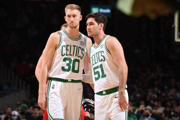 Sam Hauser of the Boston Celtics talks with Ryan Arcidiacono of the Boston Celtics during a preseason game against the Toronto Raptors on October 9,...