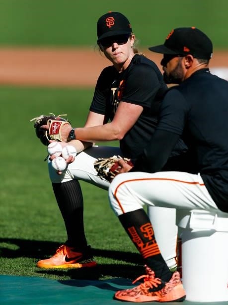 Alyssa Nakken of the San Francisco Giants looks on during batting practice prior to Game 2 of the NLDS between the Los Angeles Dodgers and the San...