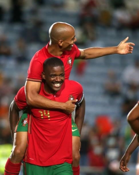 William Carvalho and Joao Mario of Portugal celebrates after Jose Fonte of Portugal scores his Goal ,during the international friendly match between...