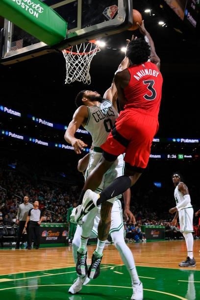Anunoby of the Toronto Raptors shoots the ball during a preseason game against the Boston Celtics on October 9, 2021 at the TD Garden in Boston,...