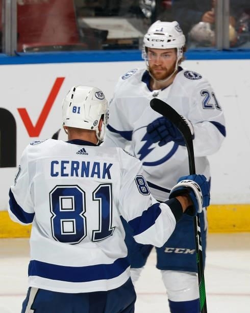 Brayden Point is congratulated by Erik Cernak of the Tampa Bay Lightning after he scored a third period goal against the Florida Panthers during a...