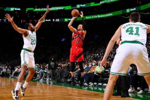 Malachi Flynn of the Toronto Raptors shoots a three point basket during a preseason game against the Boston Celtics on October 9, 2021 at the TD...