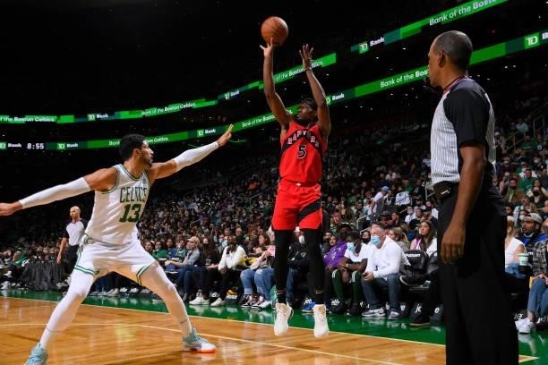 Precious Achiuwa of the Toronto Raptors shoots a three point basket during a preseason game against the Boston Celtics on October 9, 2021 at the TD...