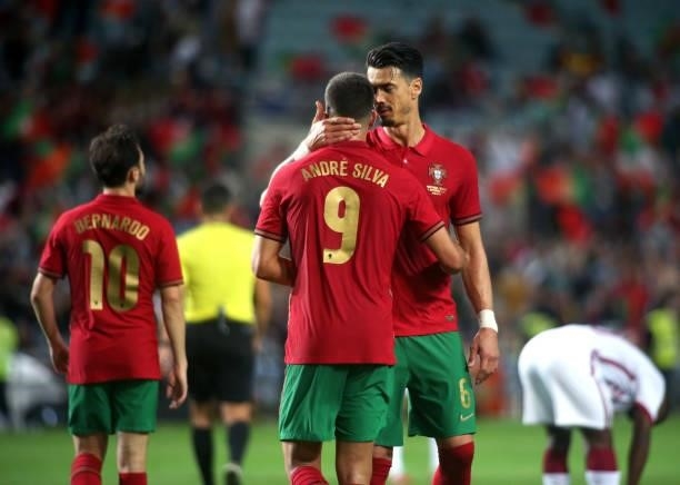 Andre Silva of Portugal celebrates with team mates Jose Fonte after scoring a goal during the international friendly match between Portugal and Qatar...