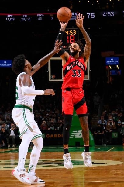 Gary Trent Jr. #33 of the Toronto Raptors shoots the ball during a preseason game against the Boston Celtics on October 9, 2021 at the TD Garden in...