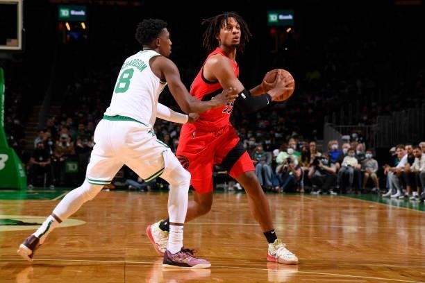 Freddie Gillespie of the Toronto Raptors looks to pass the ball during a preseason game against the Boston Celtics on October 9, 2021 at the TD...