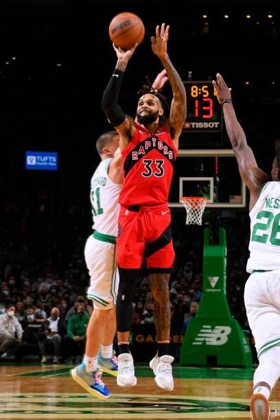 Gary Trent Jr. #33 of the Toronto Raptors shoots a three point basket during a preseason game against the Boston Celtics on October 9, 2021 at the TD...
