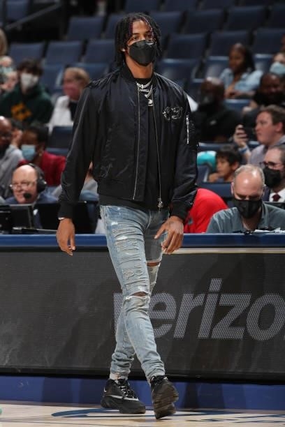 Ja Morant of the Memphis Grizzlies looks on during a preseason game against the Atlanta Hawks on October 9, 2021 at FedExForum in Memphis, Tennessee....