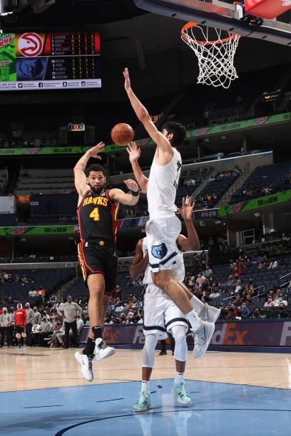 Skylar Mays of the Atlanta Hawks passes behind his head during a preseason game against the Memphis Grizzlies on October 9, 2021 at FedExForum in...