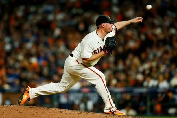 Jake McGee of the San Francisco Giants pitches during Game 2 of the NLDS between the Los Angeles Dodgers and the San Francisco Giants at Oracle Park...