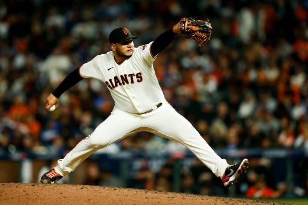 Kervin Castro of the San Francisco Giants pitches during Game 2 of the NLDS between the Los Angeles Dodgers and the San Francisco Giants at Oracle...