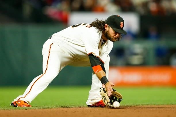 Brandon Crawford of the San Francisco Giants fields a ground ball during Game 2 of the NLDS between the Los Angeles Dodgers and the San Francisco...
