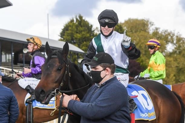 Craig Williams returns to the mounting yard on Mr Brightside after winning the Bet With Mates Cup at Sportsbet-Ballarat Racecourse on October 10,...